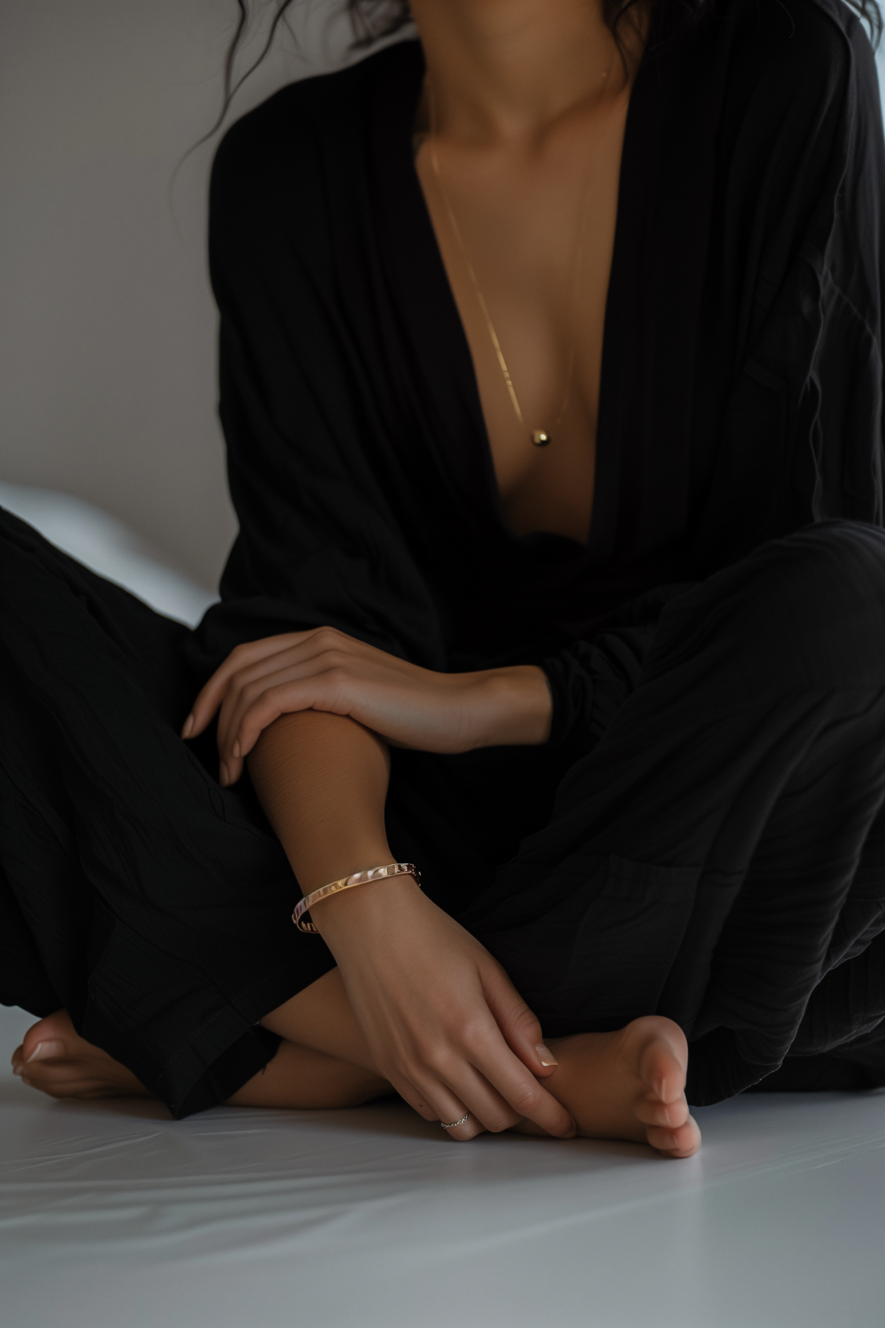 Editorial portrait, woman at a desk in warm natural light